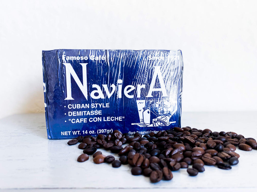 Naviera coffee in mug beside kitchen—perfect morning ritual.