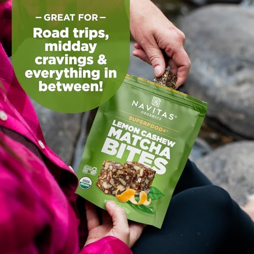 Navitas Bites Lemn Cashew Matcha in hand for a quick energizing snack.