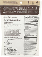 Navitas Chia Seed Powder scoop beside jar for easy, measured portions.