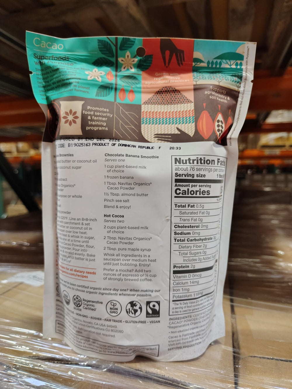 Navitas Organics cacao powder label close-up, shows fair trade and organic certifications
