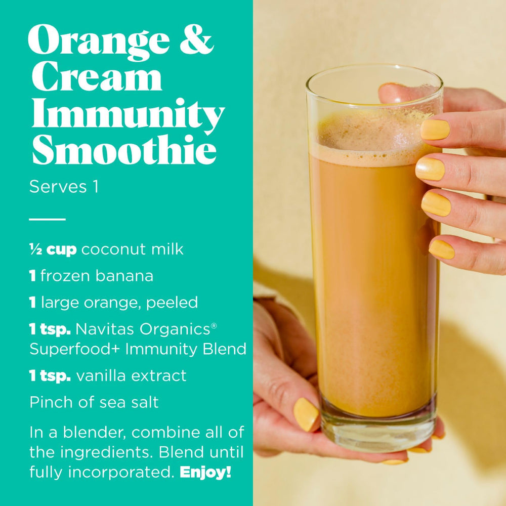 Navitas Organics Immunity Blend smoothie in a glass with bright citrus, ideal for mornings