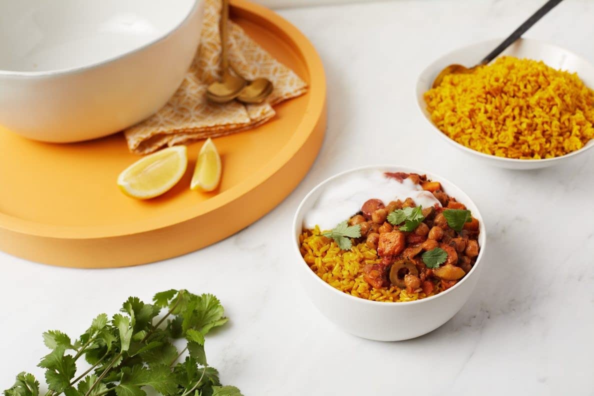 Kitchenscape highlighting organic turmeric powder, a non-GMO, vegan pantry staple.
