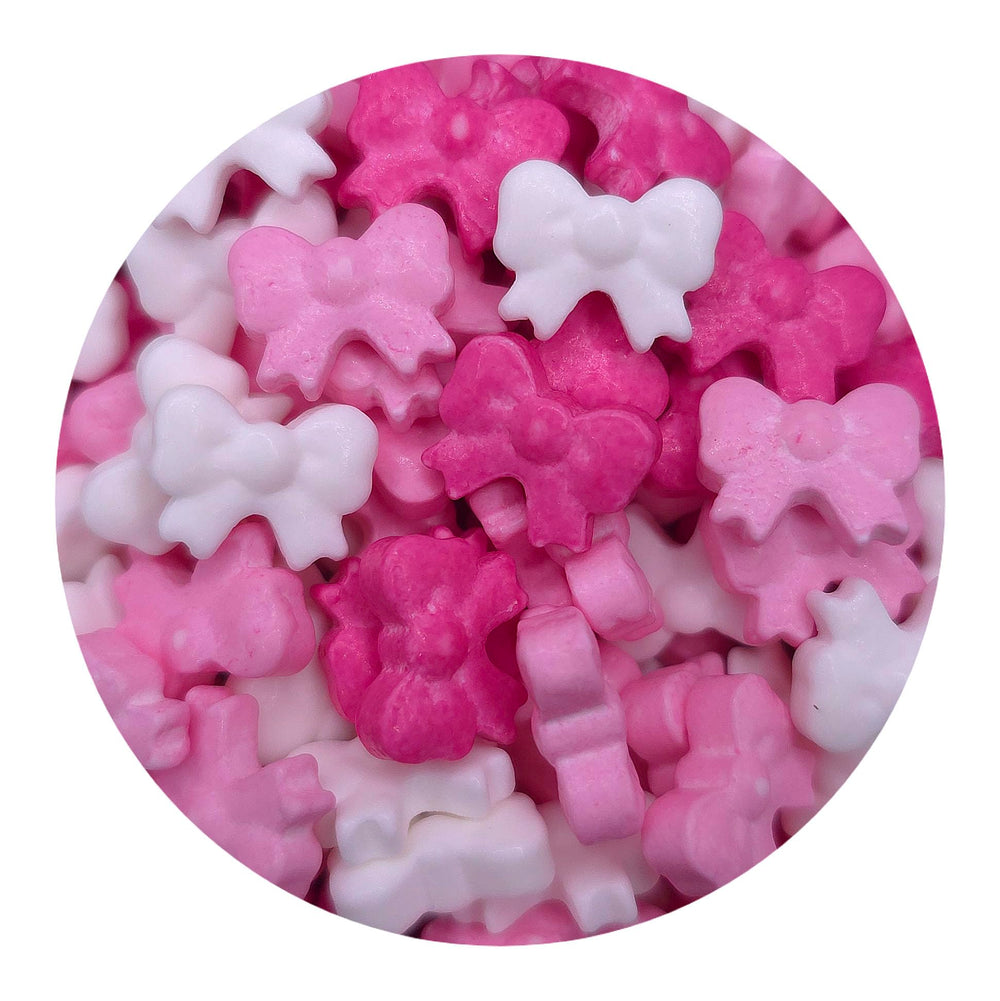 NCS hot pink bows sprinkles in a bag, ready for easy storage.