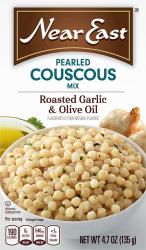 Near East pearled couscous steaming pot with simmering water for even texture.