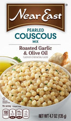 Near East pearled couscous steaming pot with simmering water for even texture.