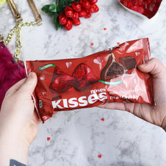 Needzo festive rose-foil wrappers brighten gift bags and candy bowls.