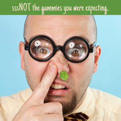 Needzo sour green boogy gummies displayed on a table for laughs