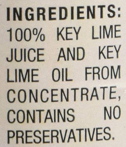 Nellie & Joe's lime juice with fresh limes, ready for cooking or baking.