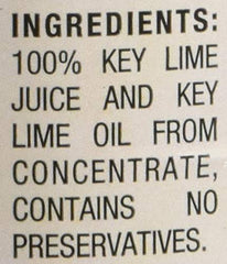 Nellie & Joe's lime juice with fresh limes, ready for cooking or baking.