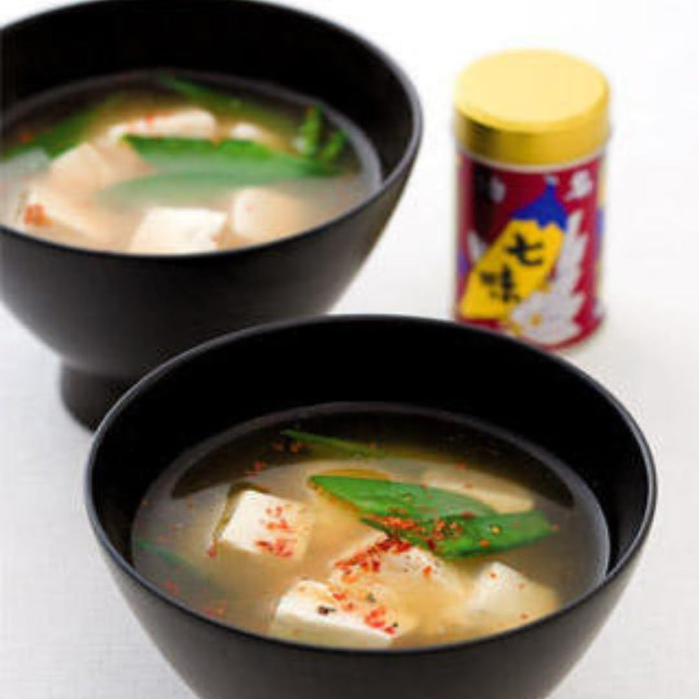 Nemoto Yawataya Isogoro Shichimi in a cozy kitchen ready to season.