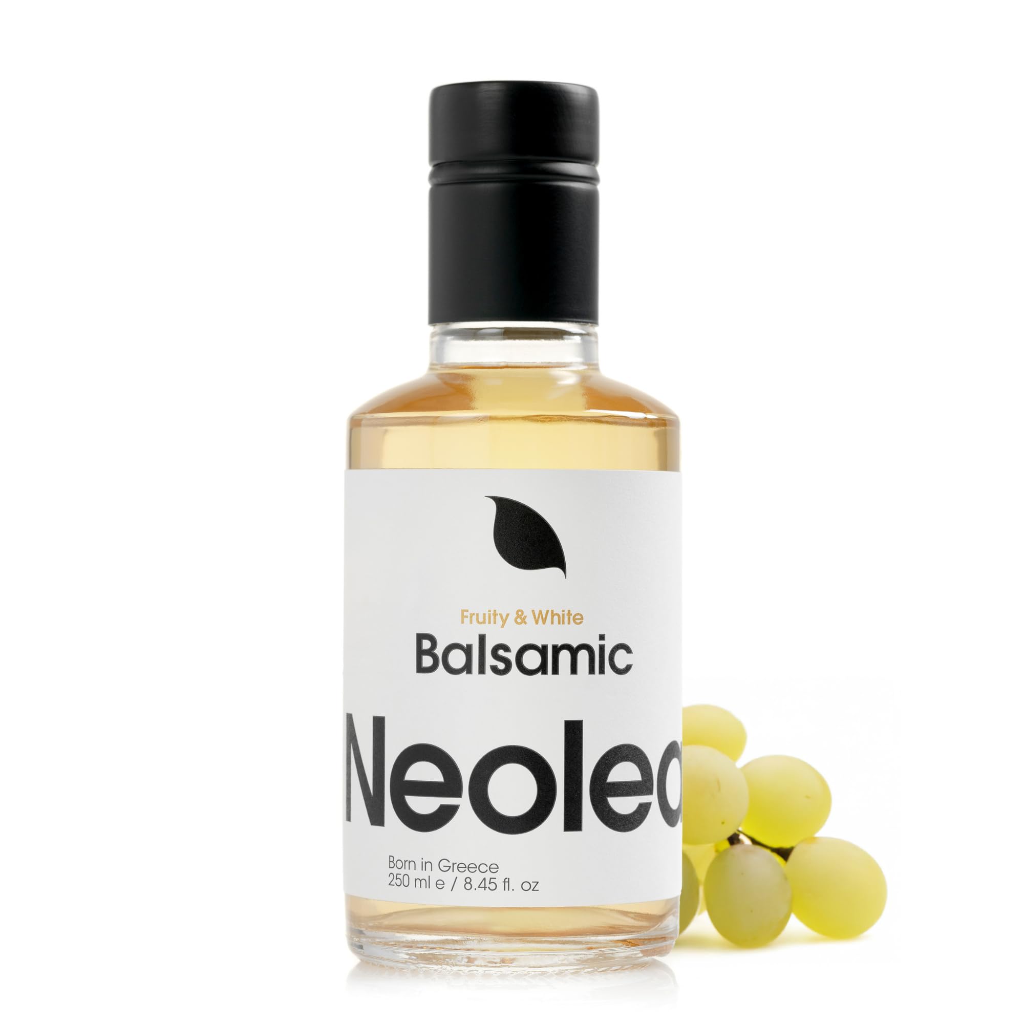 Neolea White Greek balsamic vinegar bottle pour enhances sauces and salads.