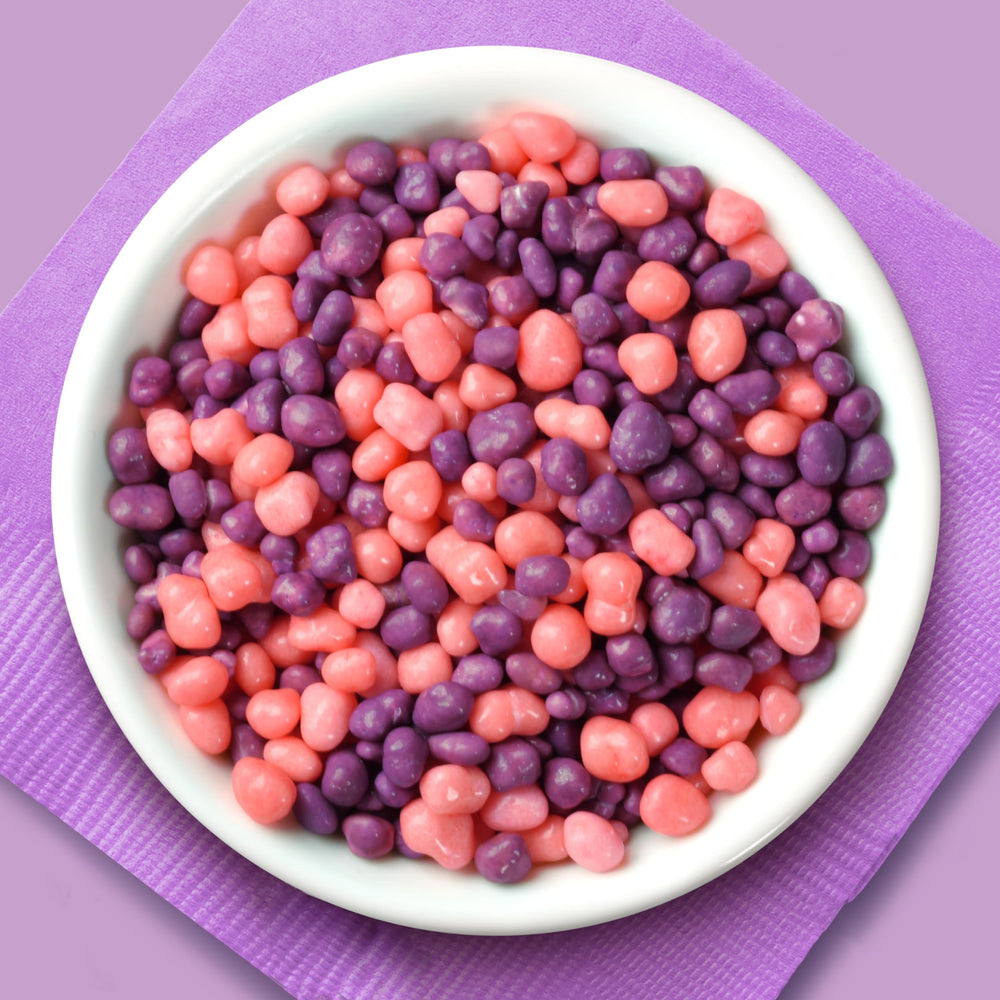 Nerds Grape & Strawberry 12-pack display near a snack bar