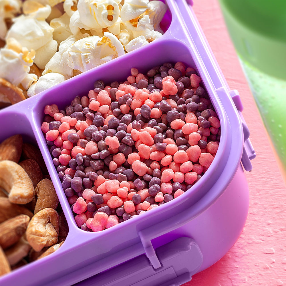 Nerds Grape & Strawberry bites spilled inviting quick snacking