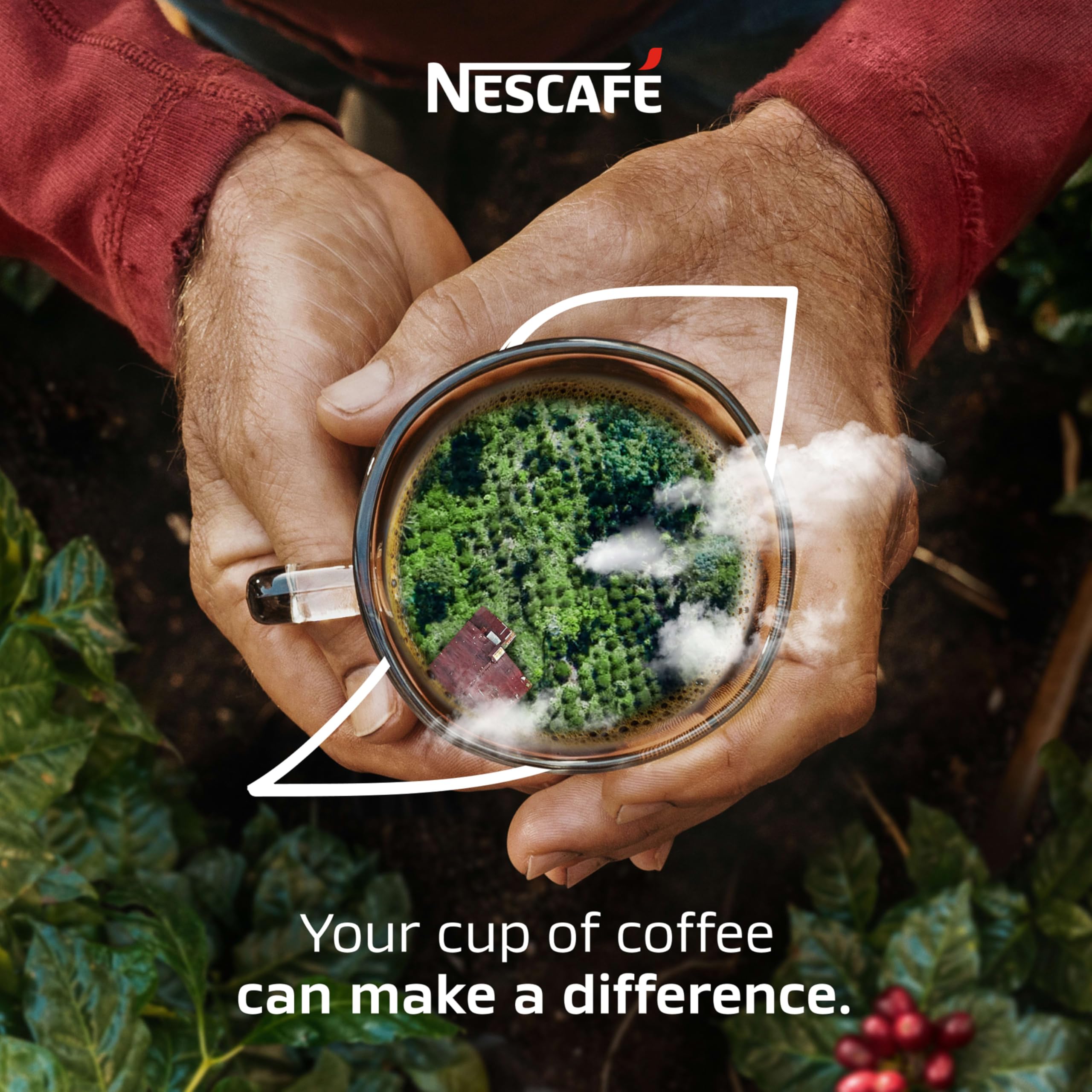 Office desk setup with NESCAFÉ Clásico Dark Roast mug during a break.