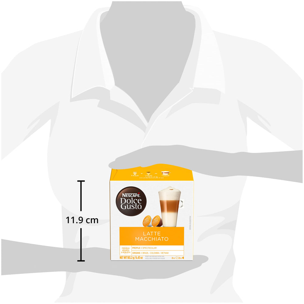 Milk capsule close-up emphasizes frothy topping for creamy texture.
