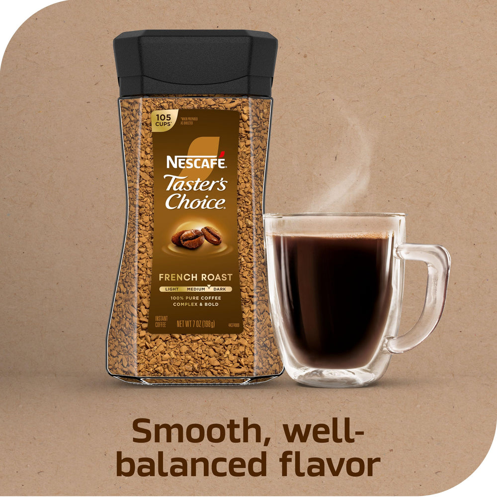 NESCAFÉ Taster's Choice French Roast spoon pouring instant coffee powder