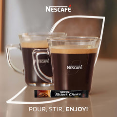 Pouring hot water over a Tasters Choice packet for instant aroma.