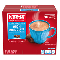 Nestle Hot Cocoa no sugar added dispenser box on a clean counter for easy serving.
