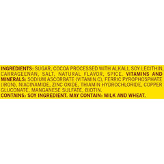 Nesquik powder stirred in milk creates a protein-boosted chocolate beverage.