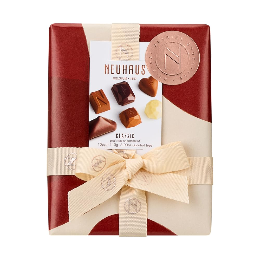 Neuhaus pralines assortment showcases milk, dark, and white chocolate varieties for refined indulgence.