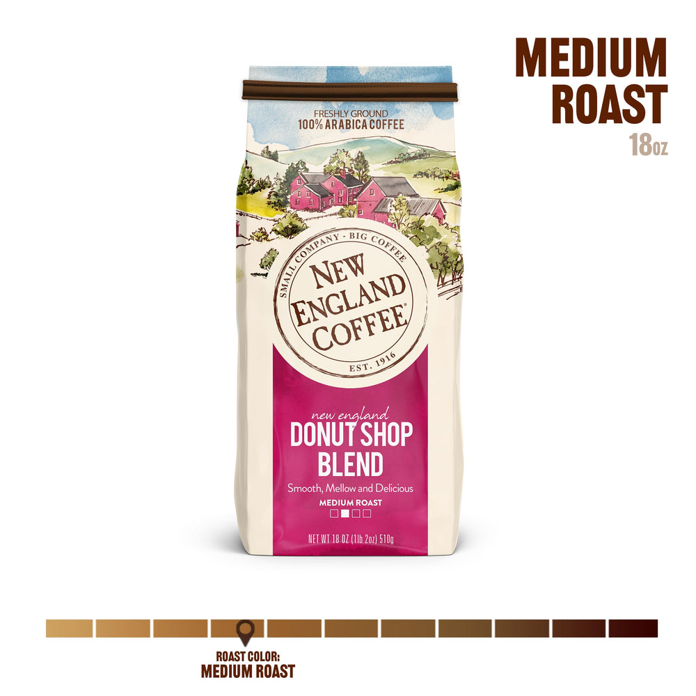 New England Coffee Donut Shop Blend ground coffee close-up shows 100% Arabica quality.