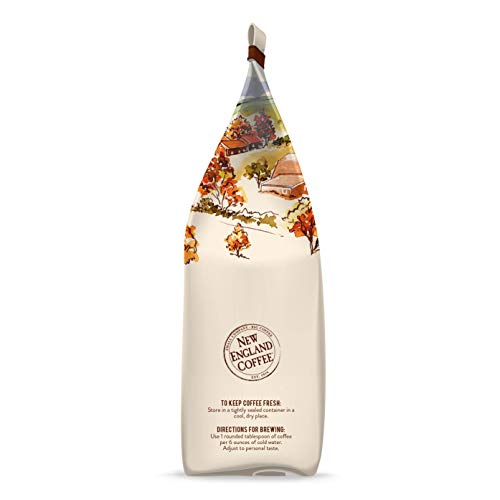 New England Coffee pumpkin spice steaming cup showcases inviting aroma for seasonal sipping.