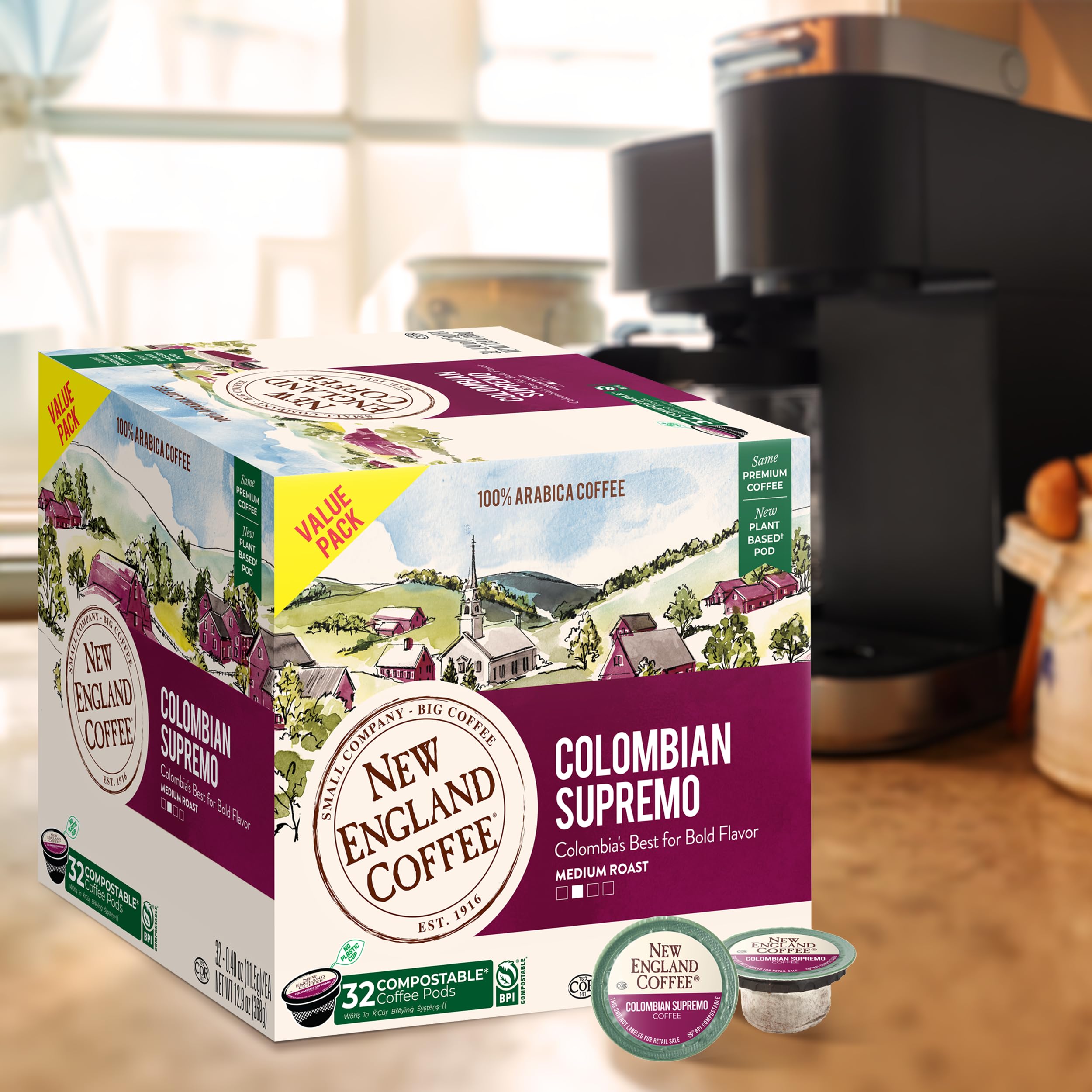 Sustainability-focused image of New England Coffee pods with eco-friendly packaging.