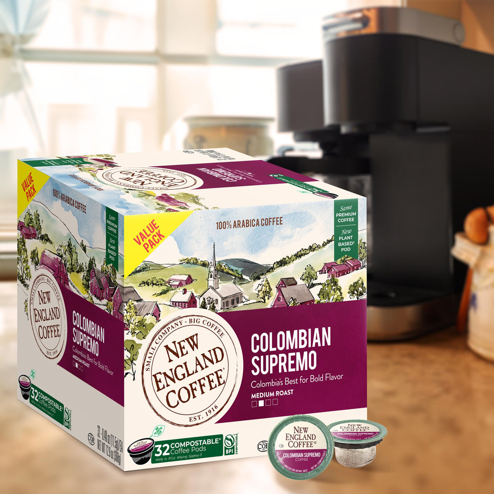 Sustainability-focused image of New England Coffee pods with eco-friendly packaging.