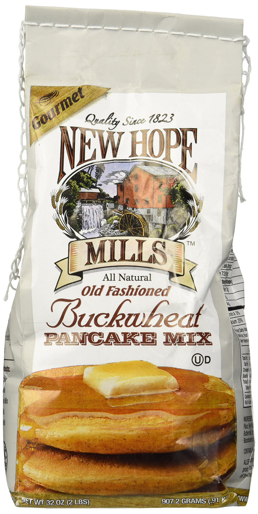 New Hope Mills Old Fashion Buckwheat Pancake Mix pour scene showing quick batter for easy mornings