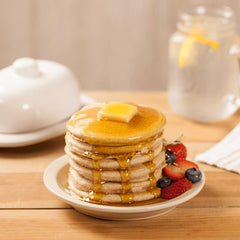 New Hope Mills pancake batter being poured for quick, versatile breakfasts.