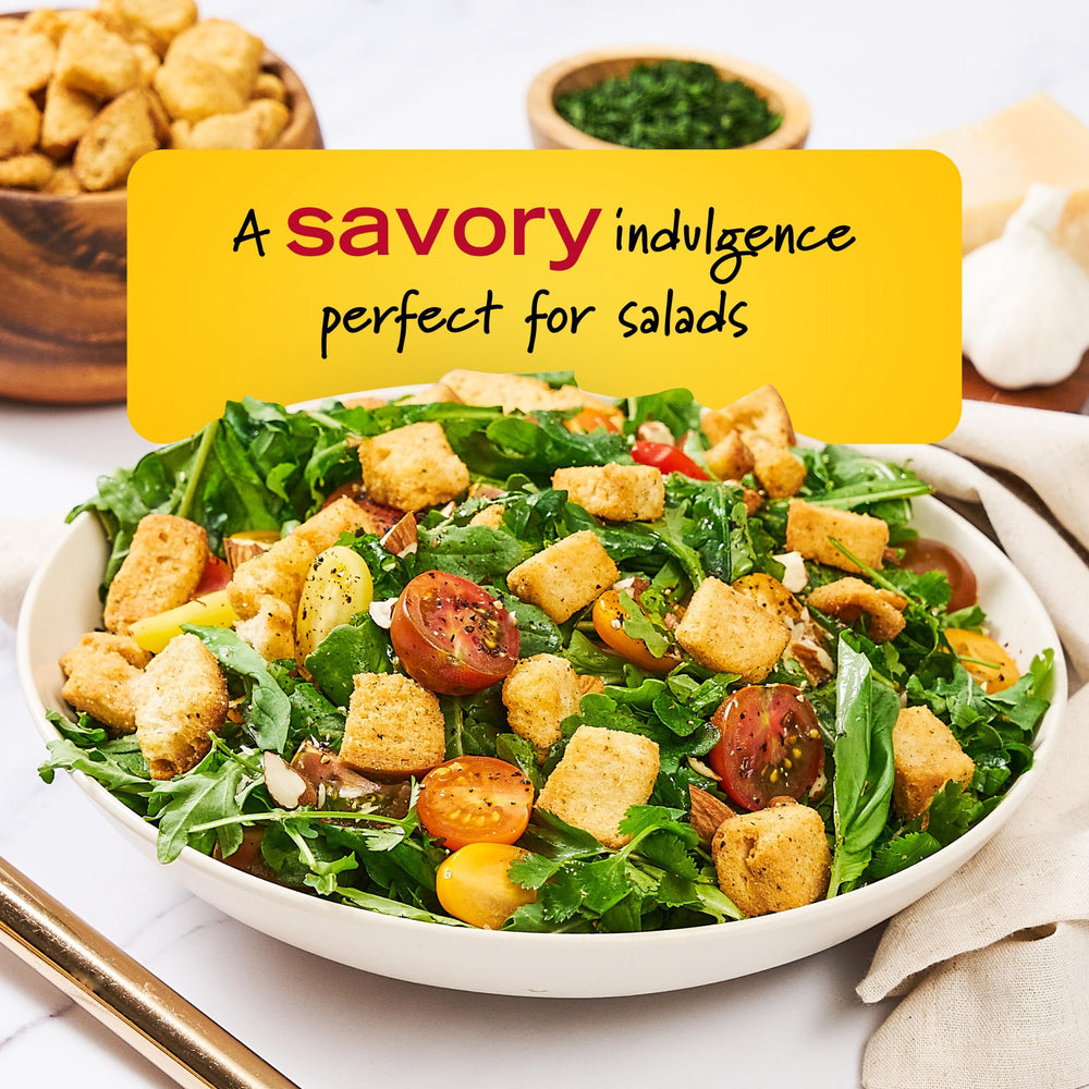 New York Bakery croutons with toasted texture atop a steaming bowl of soup.
