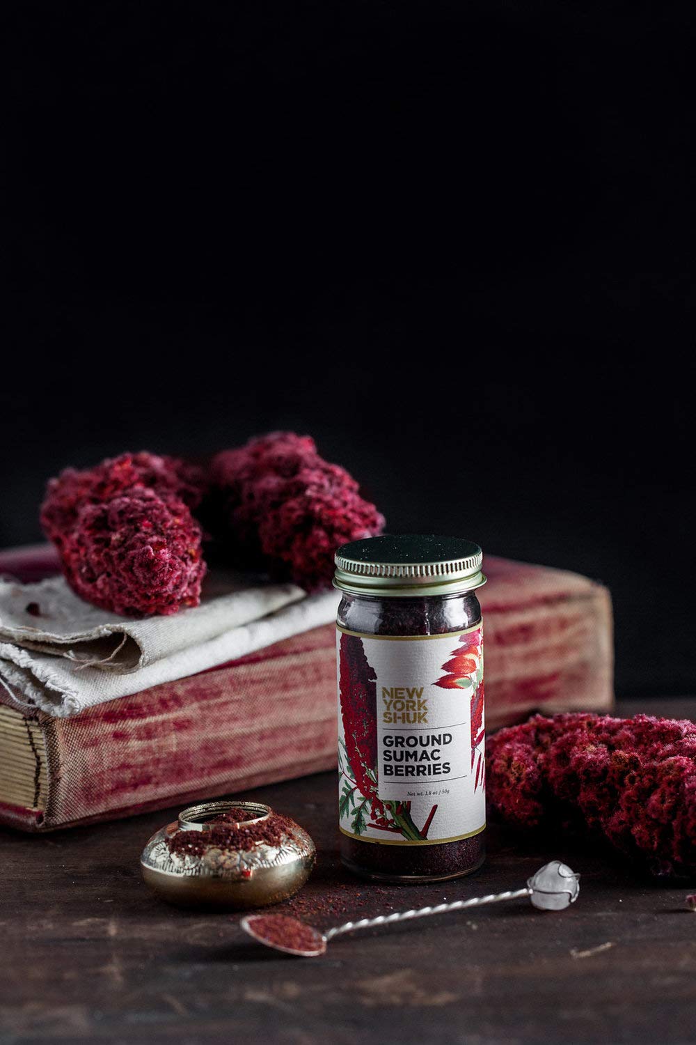 New York Shuk Ground Sumac Berries being sprinkled adds tangy depth to grains and vegetables.
