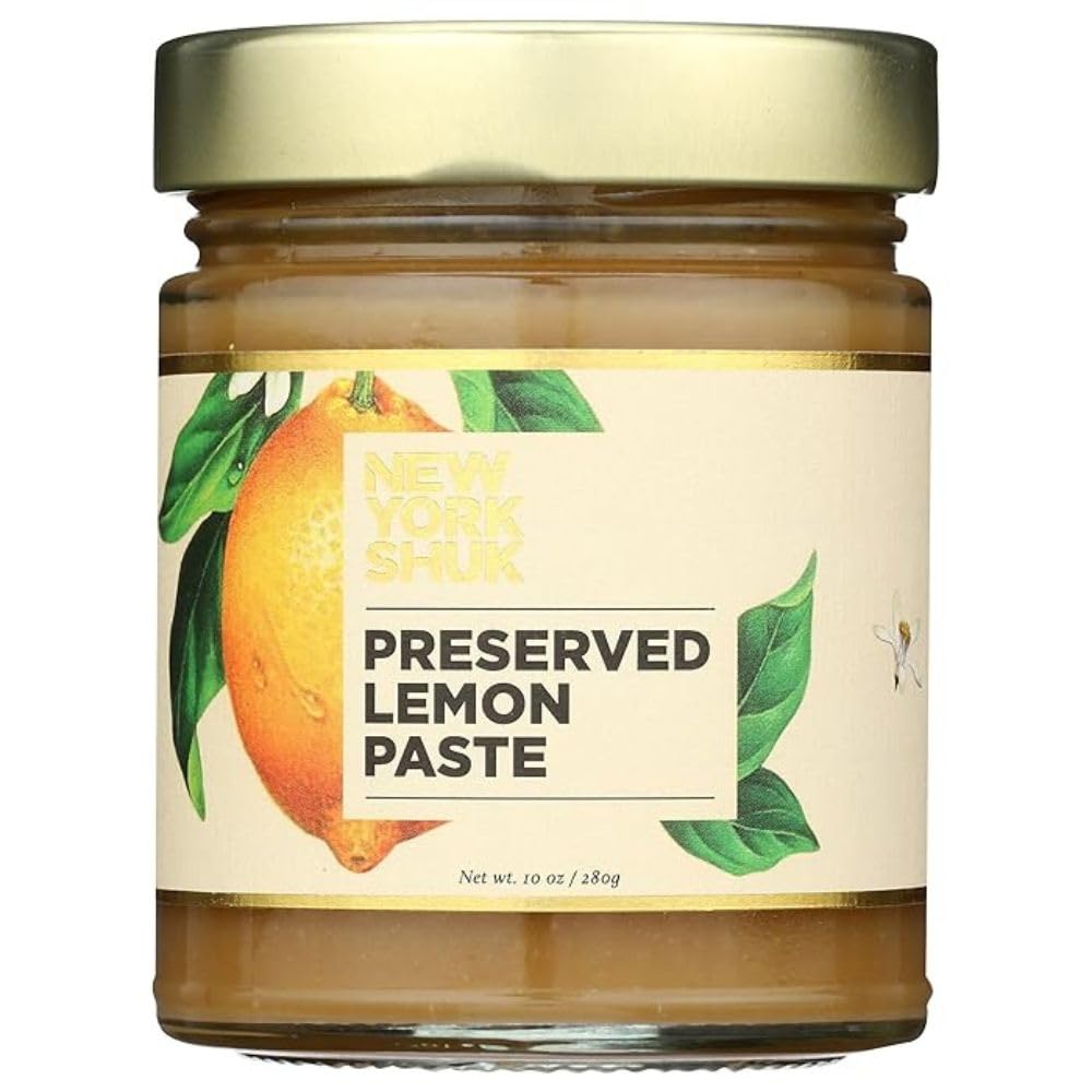 New York Shuk Preserved Lemon Paste bottle shows vibrant citrus for tagines and sauces.