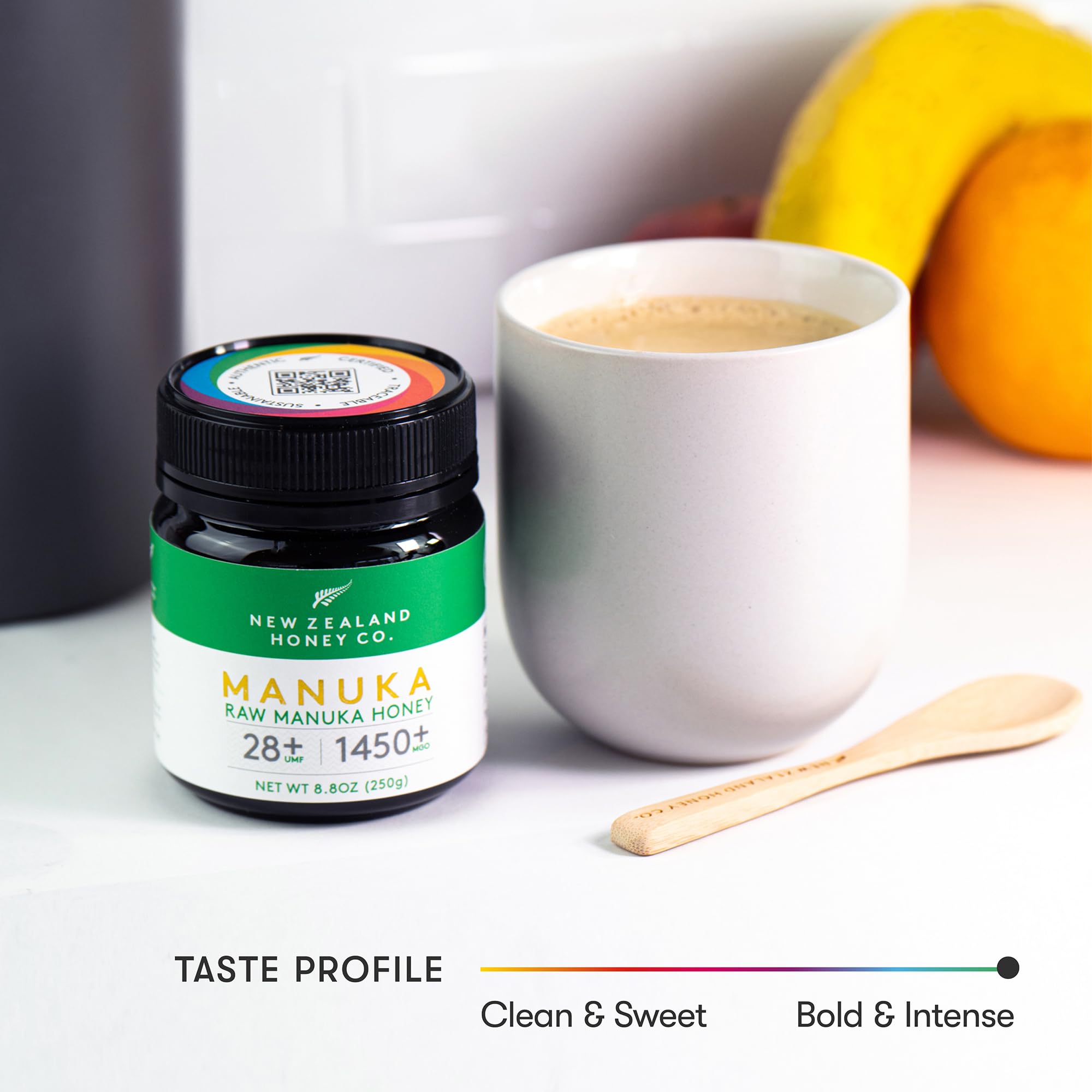 Spoon dipping into New Zealand Honey Co. honey for daily rituals