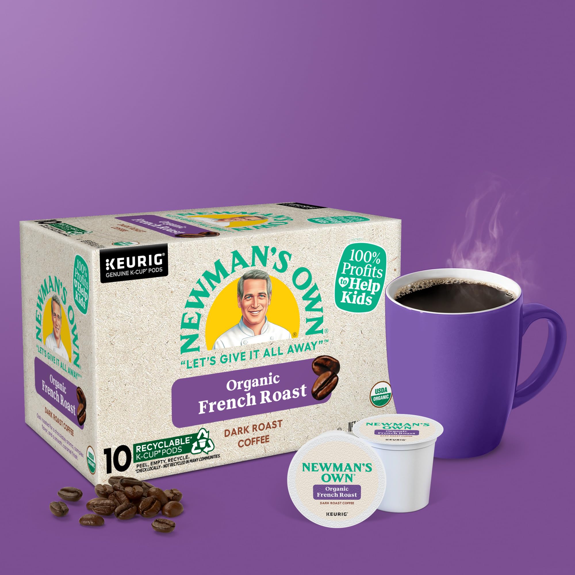 Newman's Own coffee mug steaming beside a pod box.
