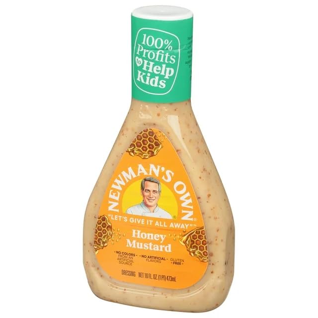 Sixteen-ounce bottle of Newman's Own Honey Mustard Dressing ready for meals.