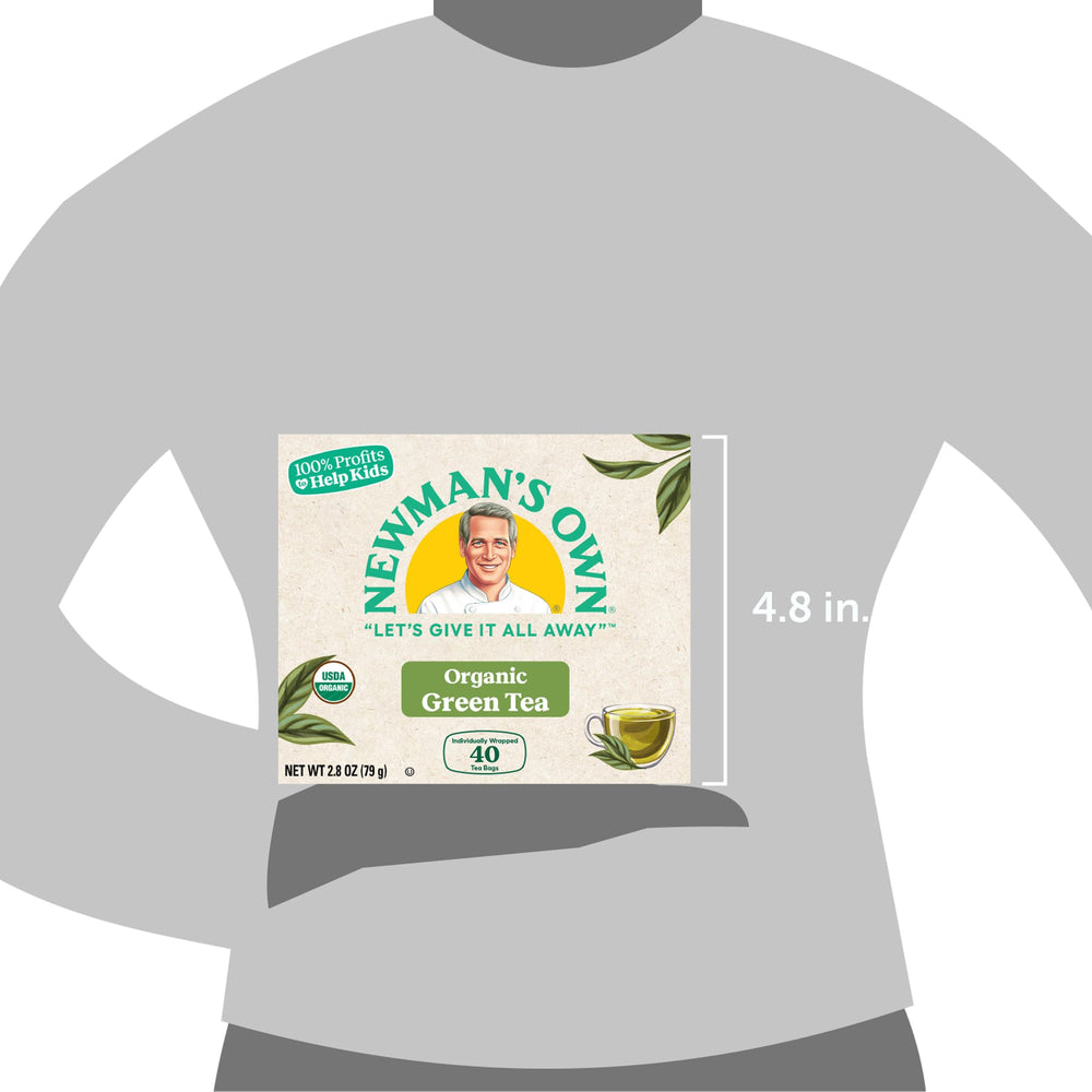 Newman's Own Organics Royal Green Tea glass pour showing crisp, clean taste.