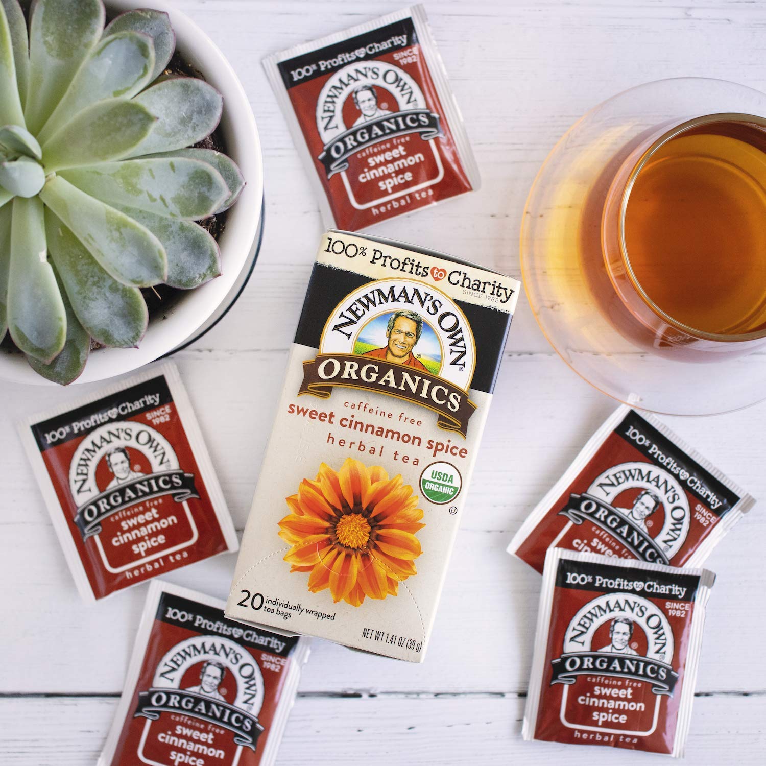 Newman's Own Organic Cinnamon Spice tea being poured hot for a cozy cup