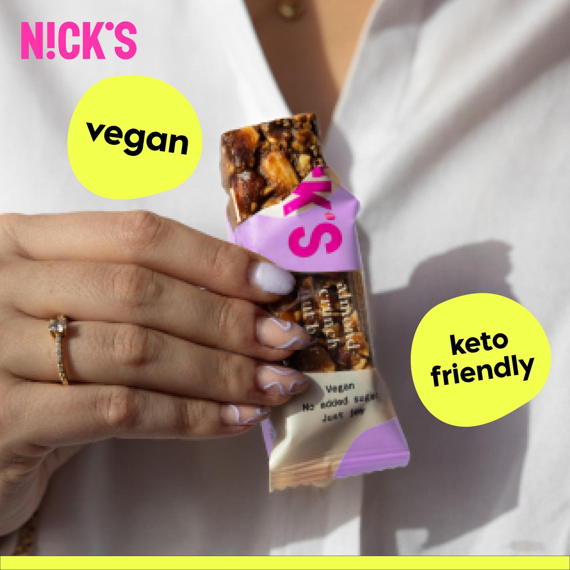 NICKS Keto Nut Bar almond chocolate foil-pack display emphasizes travel-ready snacking
