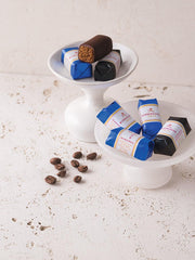 Niederegger Easter gift box packaging, elegant presentation for celebrations.