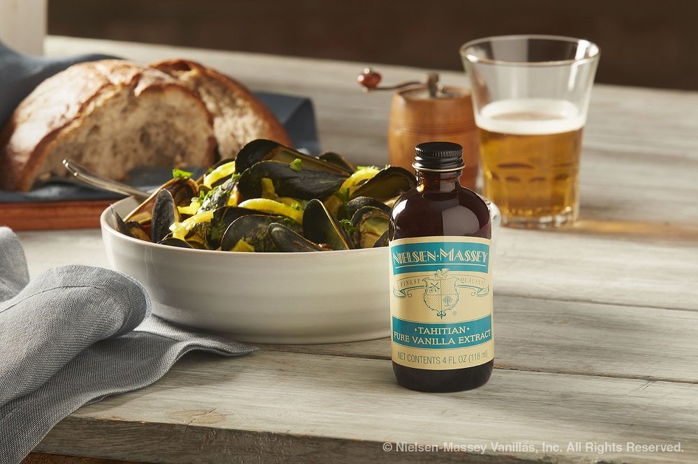 Nielsen-Massey Tahitian vanilla label close-up, emphasizing kosher and gluten-free quality.