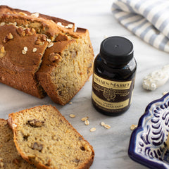 Baking setup with Nielsen-Massey vanilla bean paste ready to use.