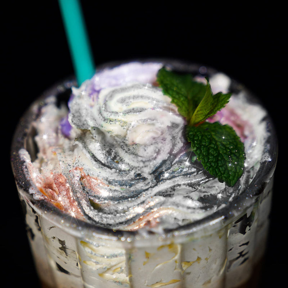 NiHome edible glimmer dust black table decor elevates dessert presentation.