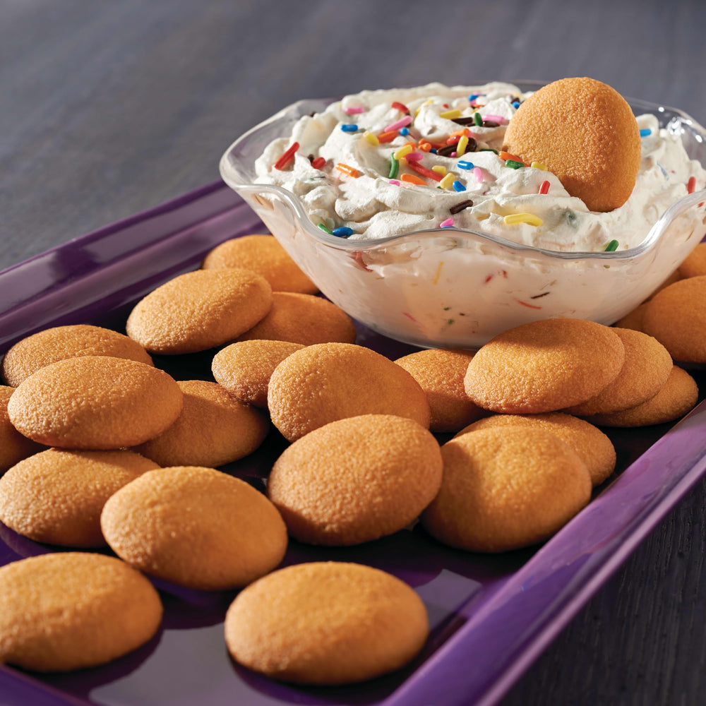 NILLA Wafers sharing at gatherings, convenient grab-and-go.