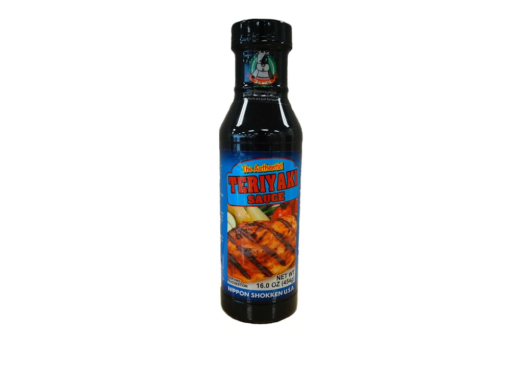 Nippon Shokken Teriyaki Sauce bottle pouring, ideal for quick weeknight glazes.