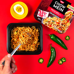 Nissin Chow Mein Teriyaki Beef with bok choy, cabbage, and carrots for colorful texture.