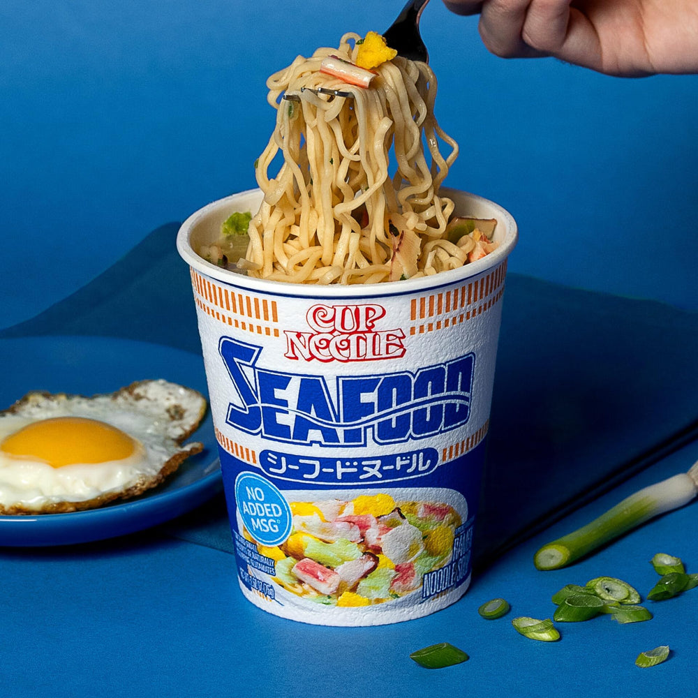 Nissin Cup Noodles Seafood calamari, eggs, and cabbage in a comforting broth.