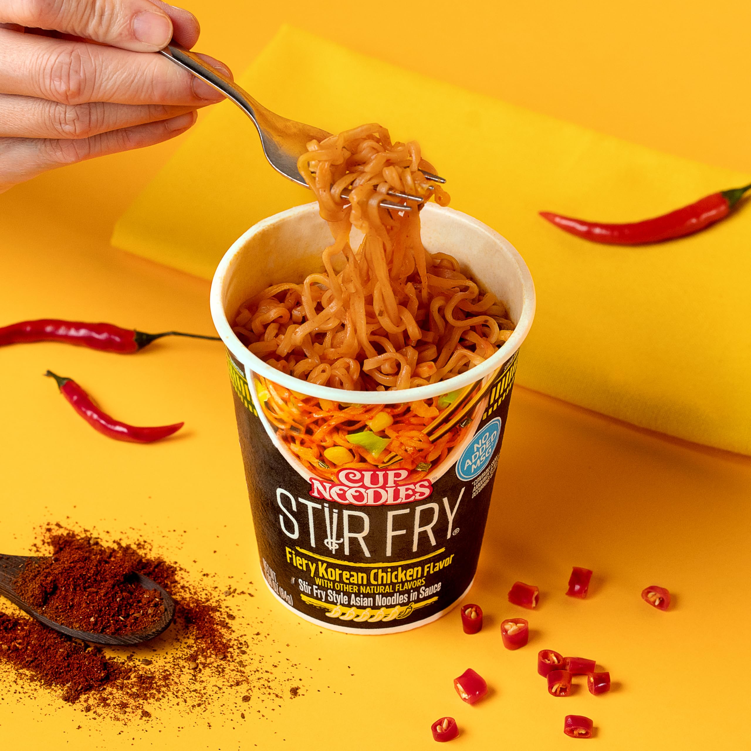 NISSIN Fiery Chicken sauce swirl emphasizes easy, flavorful heat in minutes