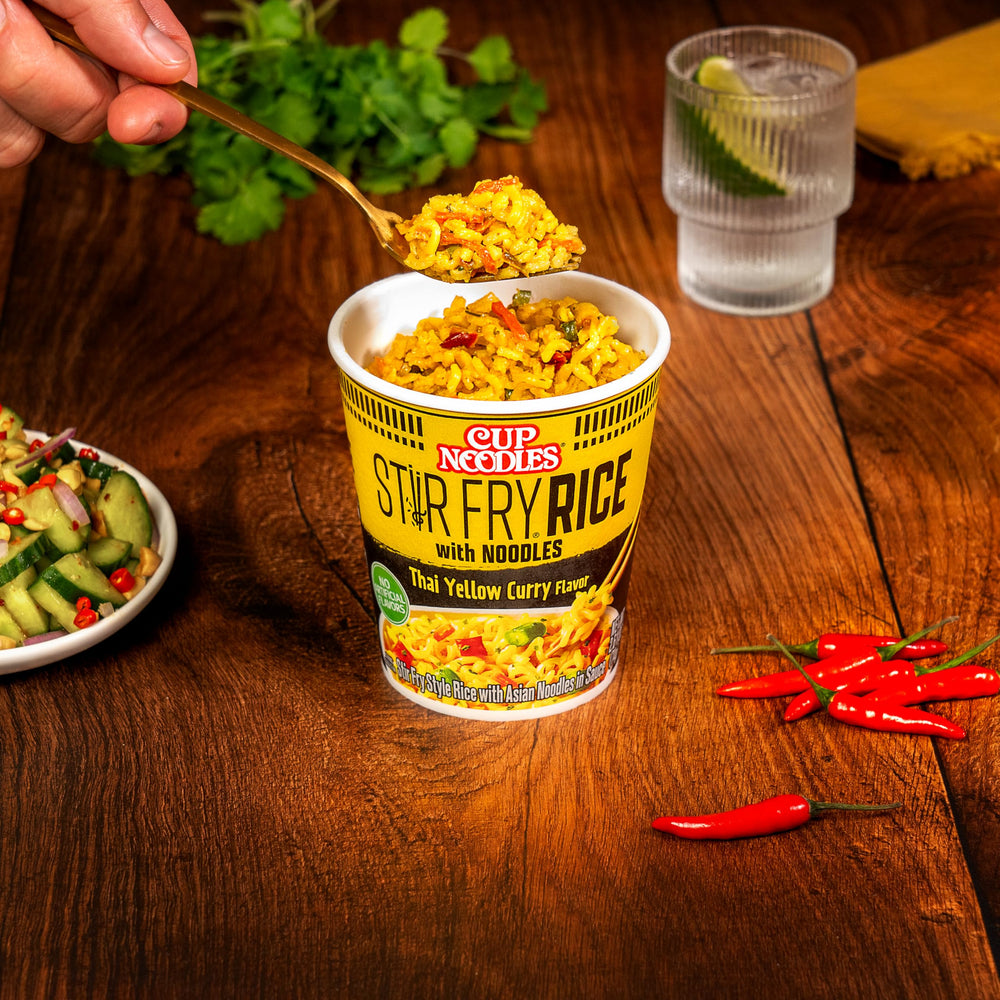 NISSIN Cup Noodles Stir Fry Rice with Noodles shows peppers and beans for color and crunch.