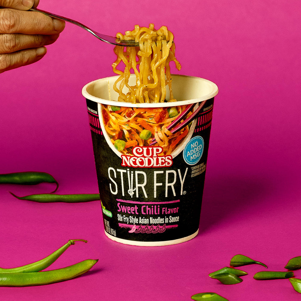 Visible vegetables and noodles in Sweet Chili sauce of NISSIN Cup Noodles